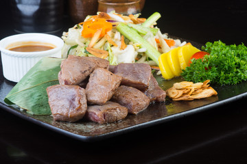 japanese cuisine. beef cube on the background