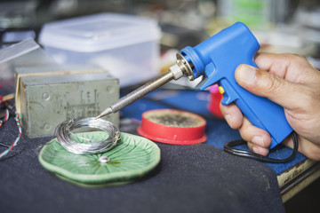 Electronic working place with soldering iron