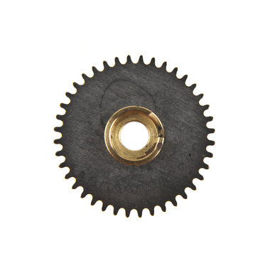 gears from an old clock isolated on a white background close-up