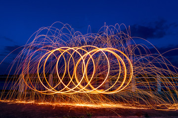 Man Spinning Burning Steel Wool