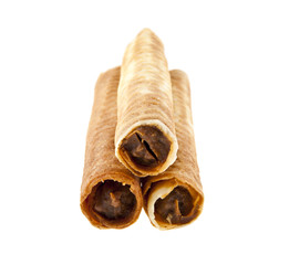waffle rolls with filling isolated on white background close-up