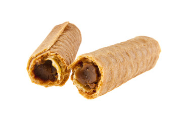 Wafer tubes with stuffing isolated on white background closeup