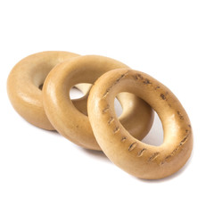 three sweet golden baked bagels close