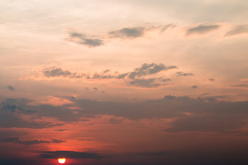 colorful dramatic sky with cloud at sunset.