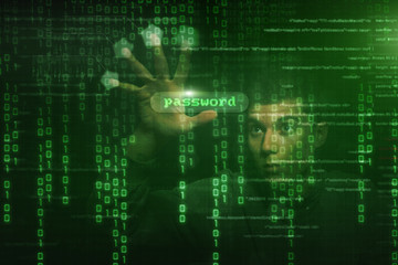 Hacker at work with graphic user interface around
