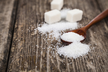 Wooden spoon with sugar