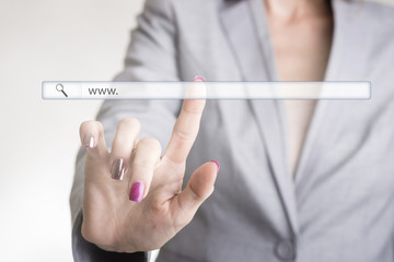 Female hand touching a website navigation bar