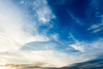 colorful dramatic sky with cloud at sunset.