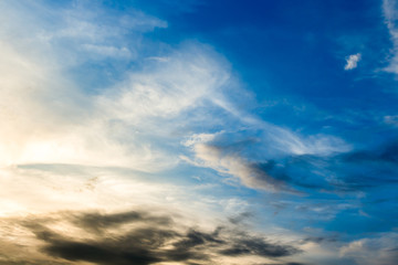 colorful dramatic sky with cloud at sunset.