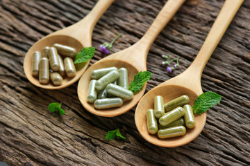 Herbal medicine in capsules from organic herb for healthy eating 