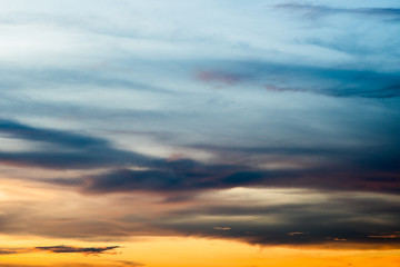 colorful dramatic sky with cloud at sunset.