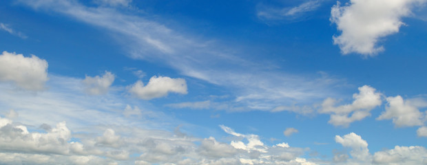 cumulus clouds in the blue sky