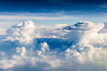 Fototapeta premium blue sky with the clouds from the plane view