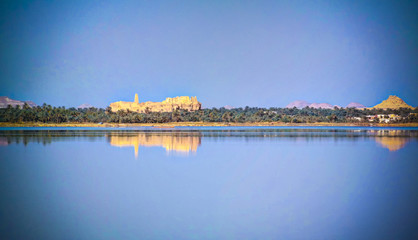Panorama of Zaytun lake, Ruins of the Amun Oracle temple and mountain Dakrour in Siwa oasis, Egypt in Siwa oasis, Egypt
