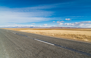 Federal highway M-52 Chuysky tract against the blue clear sky.