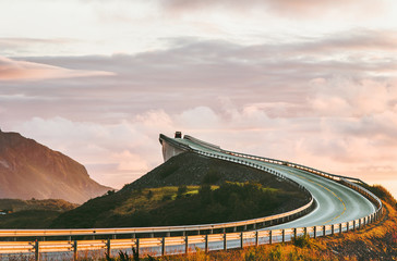 Atlantic road in Norway Storseisundet bridge over ocean way to clouds scandinavian travel landmarks - obrazy, fototapety, plakaty
