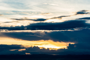 colorful dramatic sky with cloud at sunset.