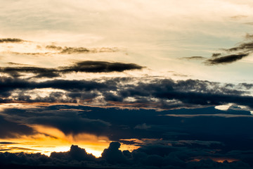colorful dramatic sky with cloud at sunset.
