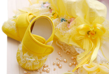 sweet yellow spruce baby's shoes