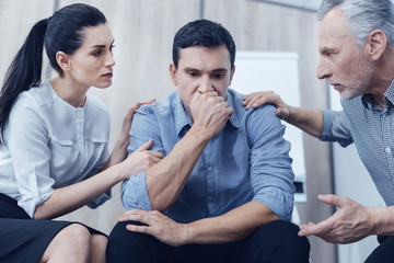 Upset office worker thinking about his future