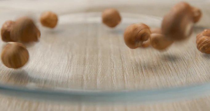 Nuts falling slowmotion &ndash; orginal file&nbsp;: 4K DCI, PRO RES 444, 12 bits