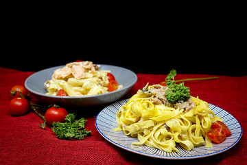 Spaghetti with aubergine and tomato sauce on a the table