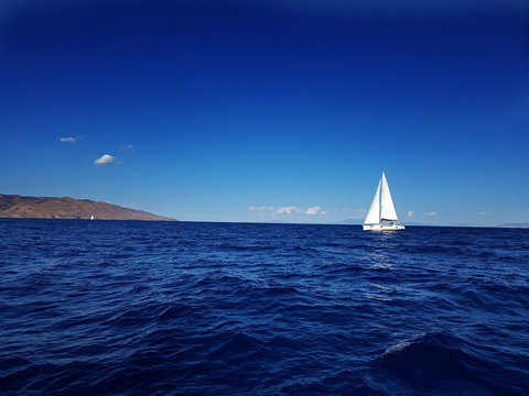 Fototapeta Seascape with a yacht on the horizon