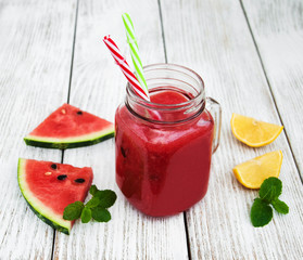 Jars with watermelon smoothie