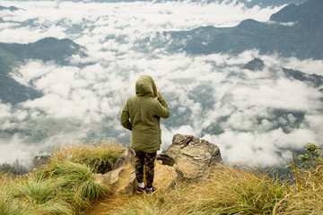 Fototapeta premium Tourist stand on view point at phu chi fah chiang rai Thailand