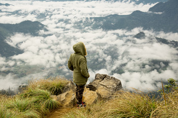 Fototapeta premium Tourist stand on view point at phu chi fah chiang rai Thailand