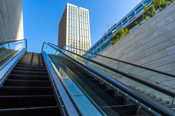 the elevator with modern buildings in the cityscape