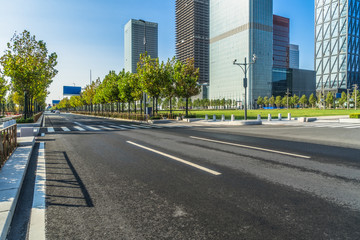city road through modern buildings in the downtown