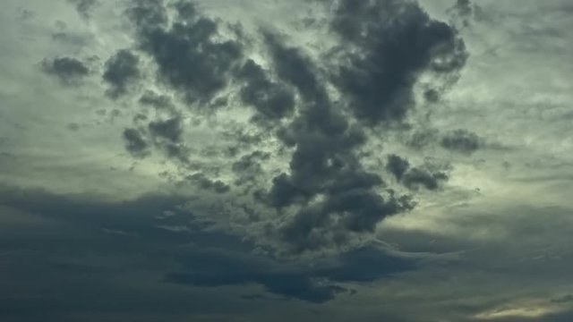 Perfect gray storm cloud dissolves above steens mountain summit