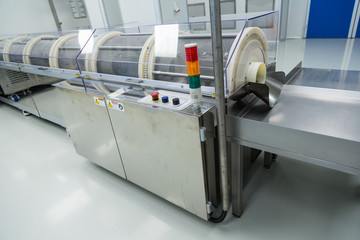 big steel chromed machine with control panel