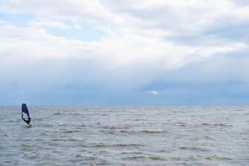 Fototapeta premium windsurfing on a stormy day