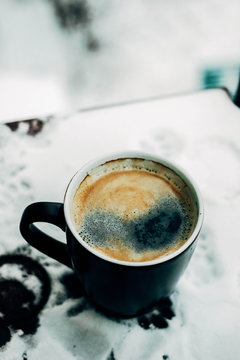 A Cup Of Coffee In The Snow