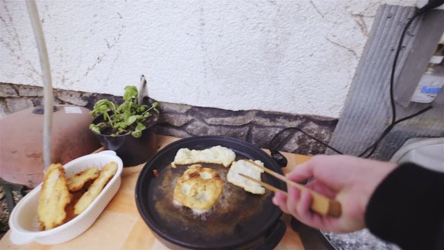 Viewpoint of frying traditional food Langos 4K