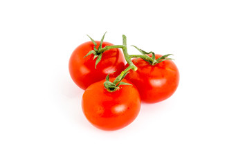 juicy ripe tomato branch on white isolated background. Delicious vegetable healthy snack