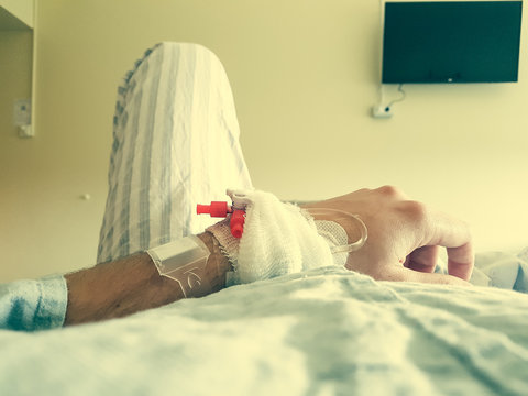 Patient Point Of View Lying On A Medical Bed.