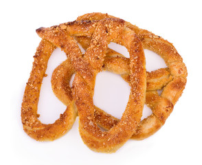 Sweet pretzels on white background