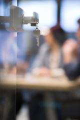 Open  glass door with keys