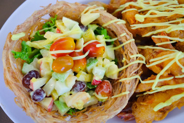 Fruit salad with fried shrimp