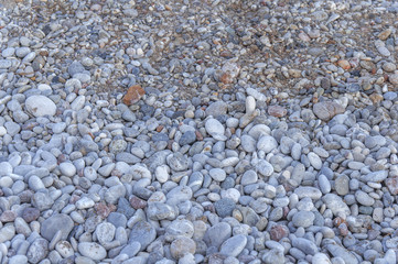 Close up texture of a lot pebble stone on the beach