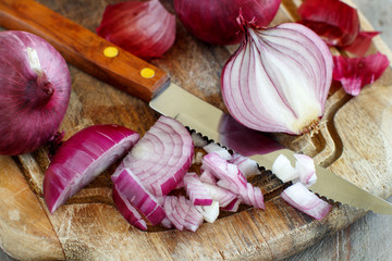 Red onions with a knife
