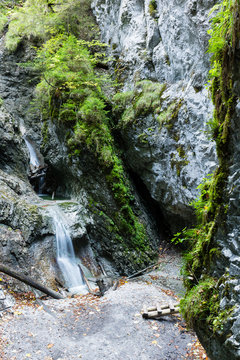 Sucha Bela gorge in Slovensky raj National park, Slovakia. Hikiing Path. Sucha Bela gorge is most popular and one of the most attractive trails. Picture shows Okienkovy vodopad waterfall.