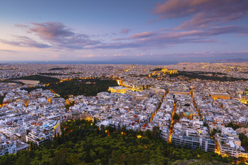 Fototapeta premium View of Acropolis and city of Athens from Lycabettus hill at sunrise, Greece. 