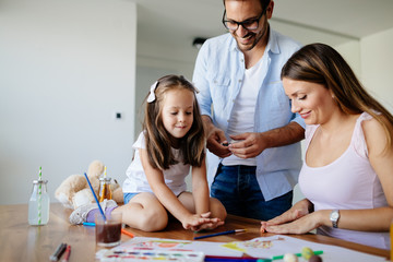 Obraz na płótnie Canvas Happy familiy spending fun time at home