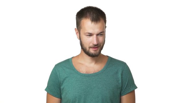 portrait of nervous adult man feeling confused expressing distraction anxious hesitating isolated white background closeup slow motion. Concept of emotions