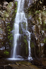 Waterfall flowing over rocks