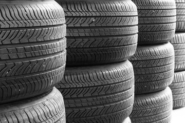 Obraz premium Car tires background in a row.